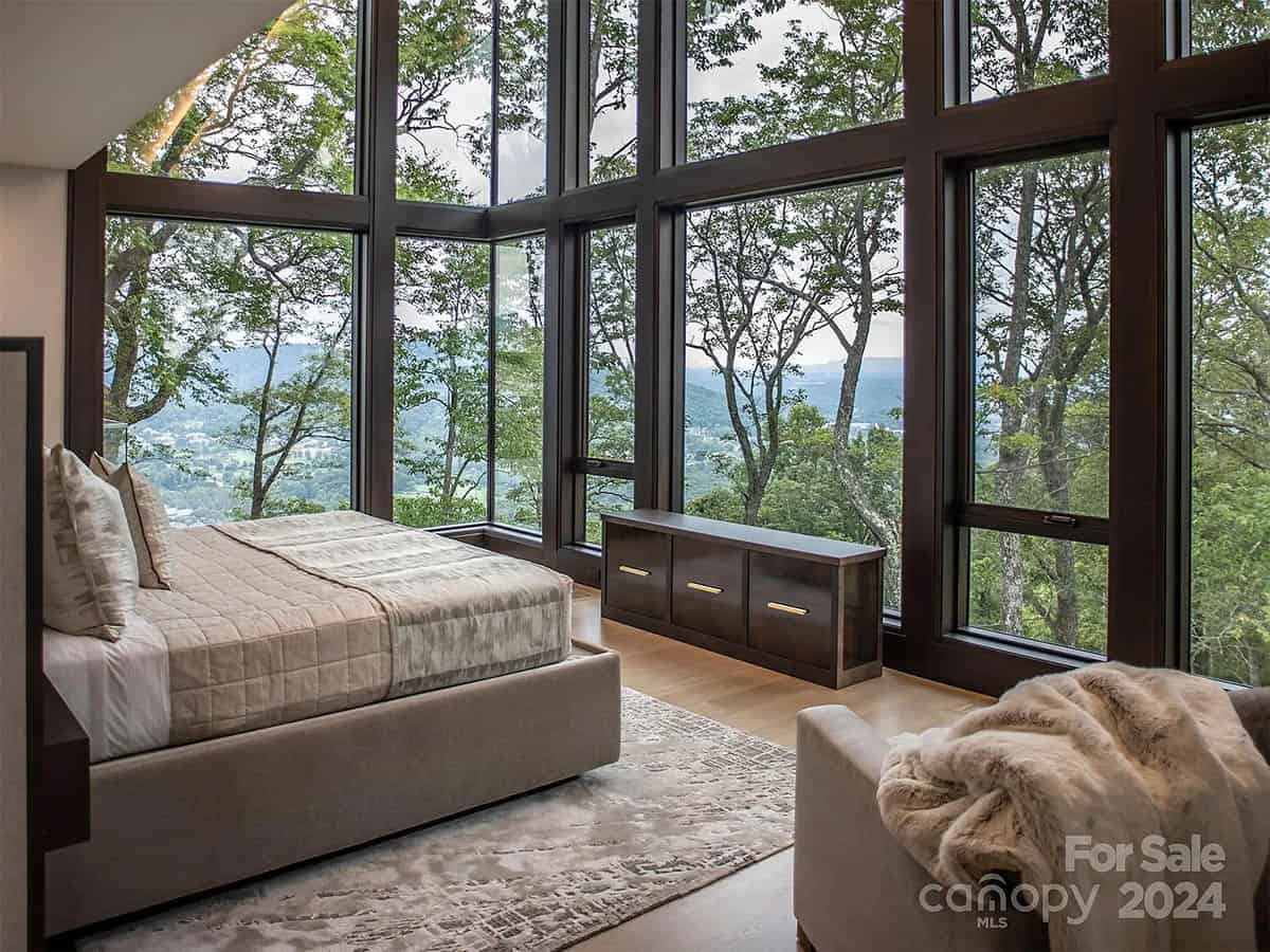 contemporary bedroom with floor-to-ceiling windows