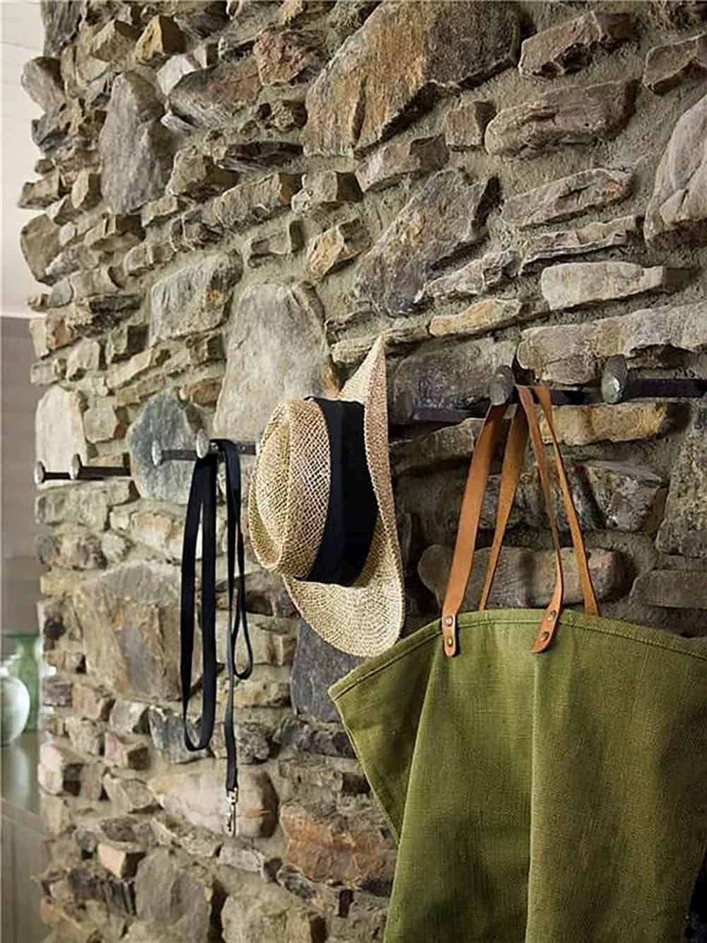 rustic stone wall with wall hanging storage