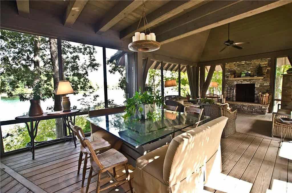 transitional style screened porch with alfresco dining