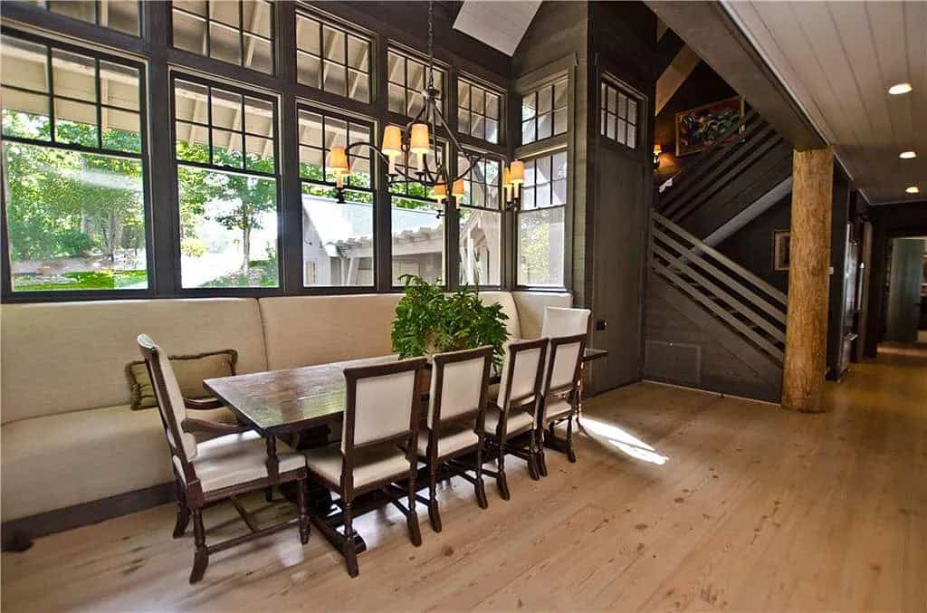 rustic dining room with a built-in banquette
