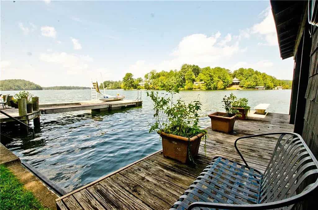 rustic lake house exterior boat dock