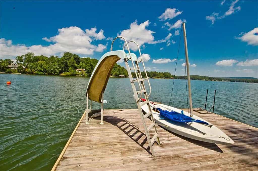 rustic lake house exterior boat dock