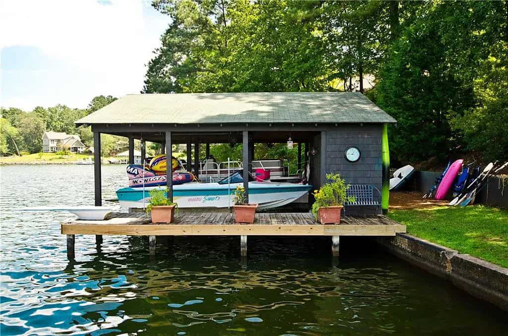rustic lake house exterior boat house