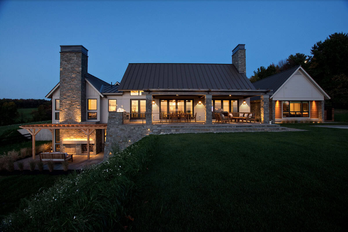 modern farmhouse exterior at dusk