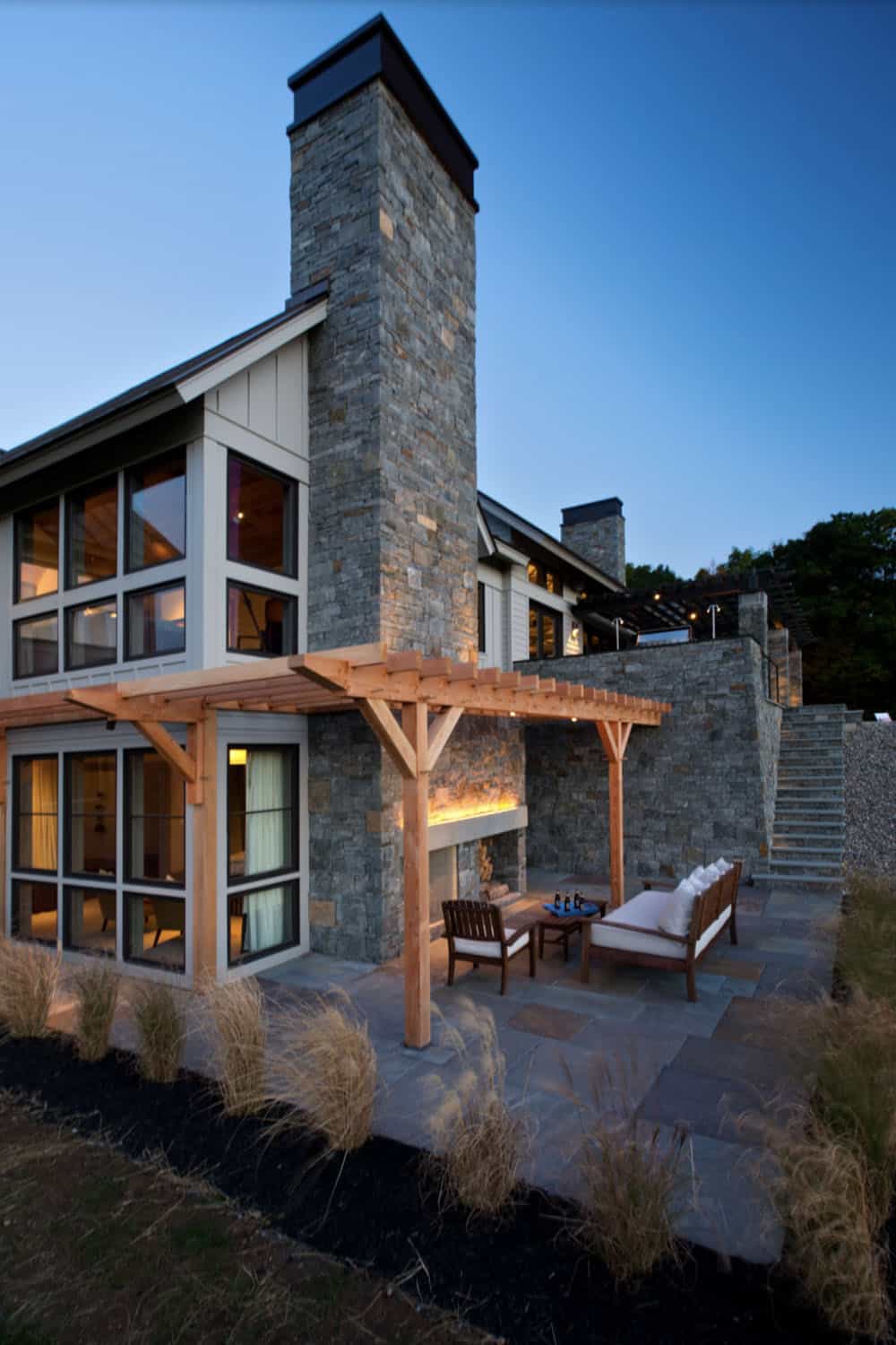modern farmhouse exterior at dusk