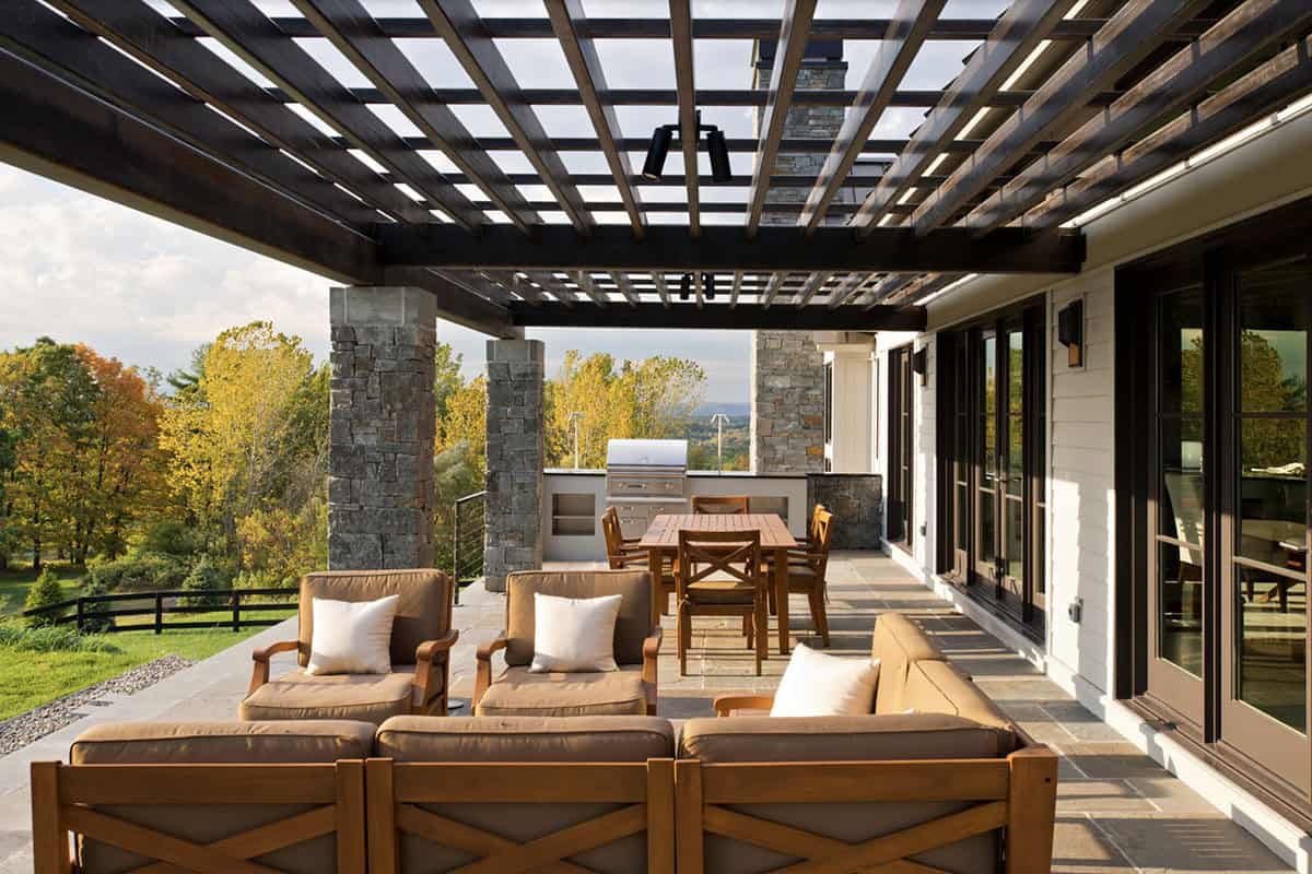 modern farmhouse exterior patio with a pergola and outdoor furniture
