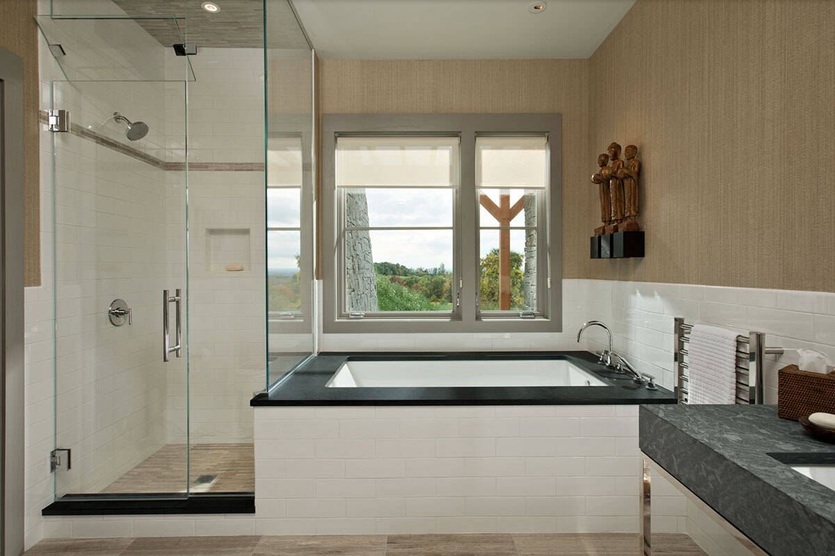 modern farmhouse style bathroom with an integrated tub