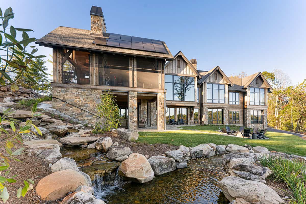 mountain home exterior backyard with a waterfall feature