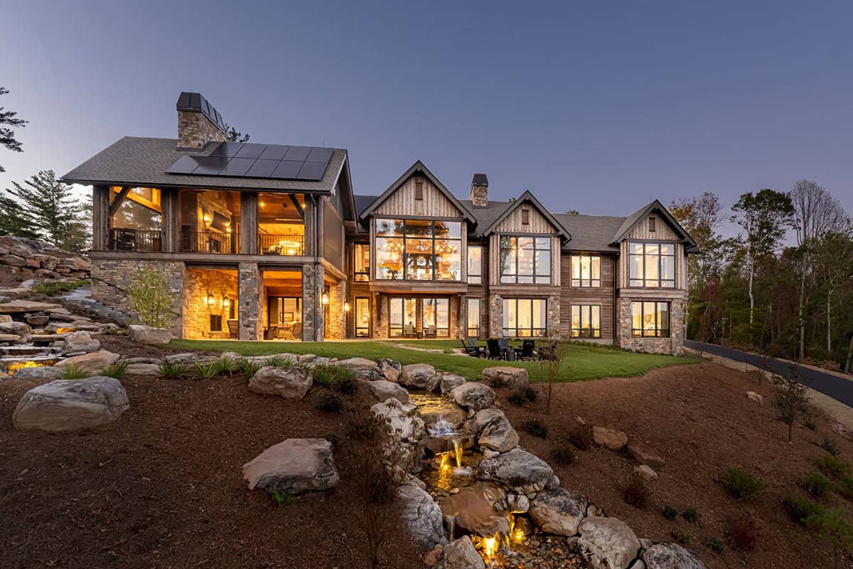 mountain home exterior backyard with a waterfall feature