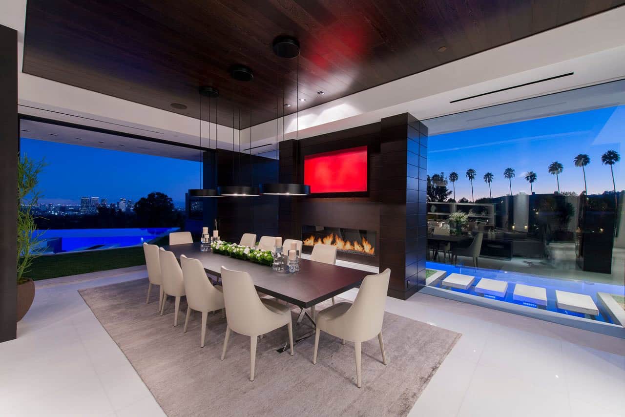 modern dining room with a fireplace
