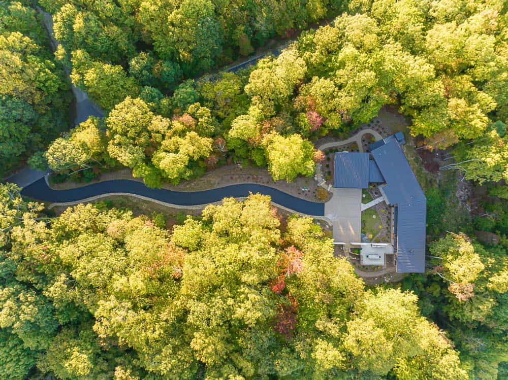 modern mountain home exterior aerial view