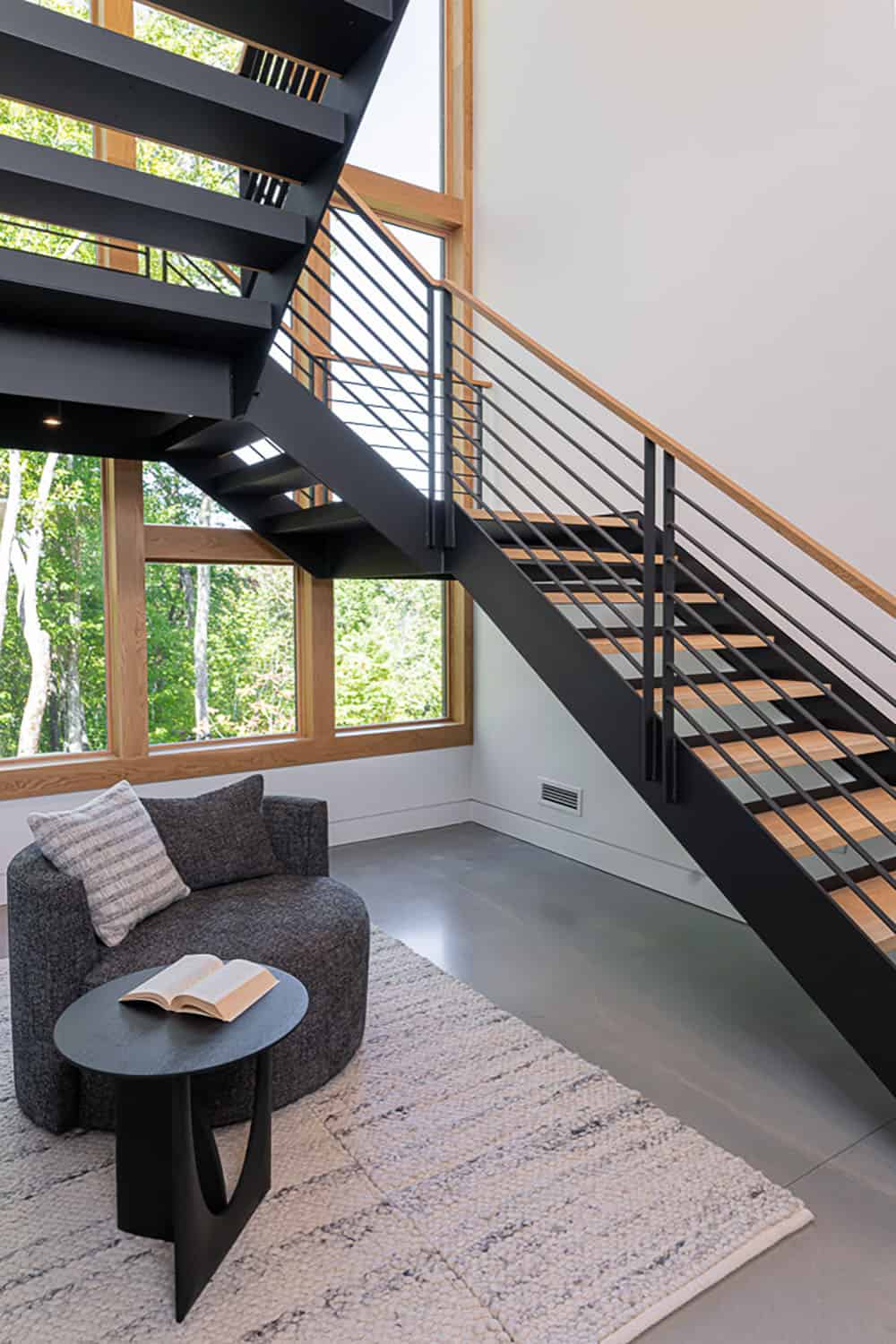 modern staircase leading to the basement level