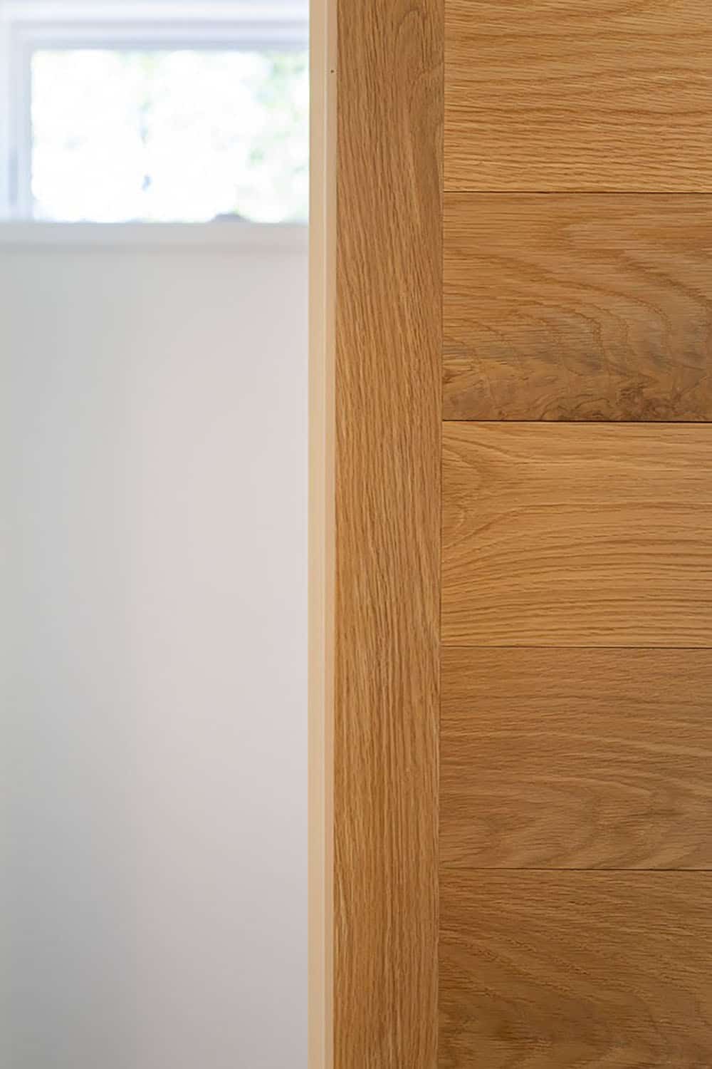 bedroom with bed wall paneling detail
