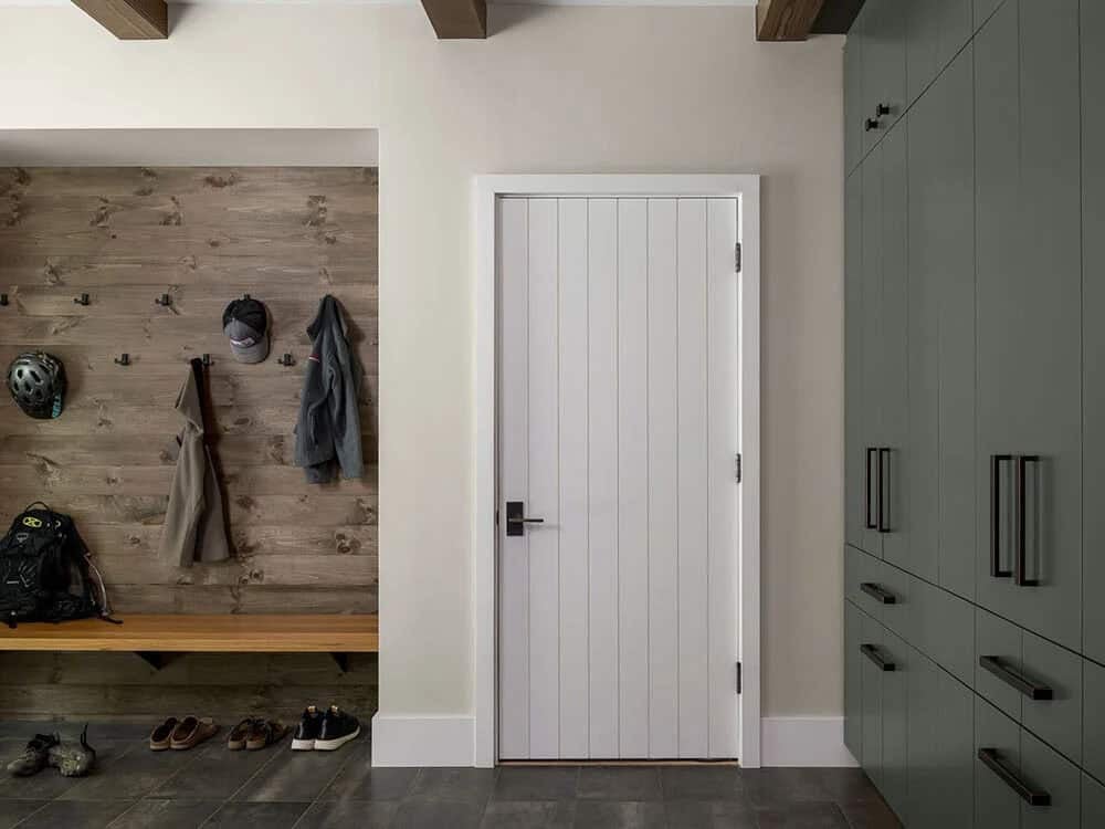 modern rustic home entry with a built-in bench