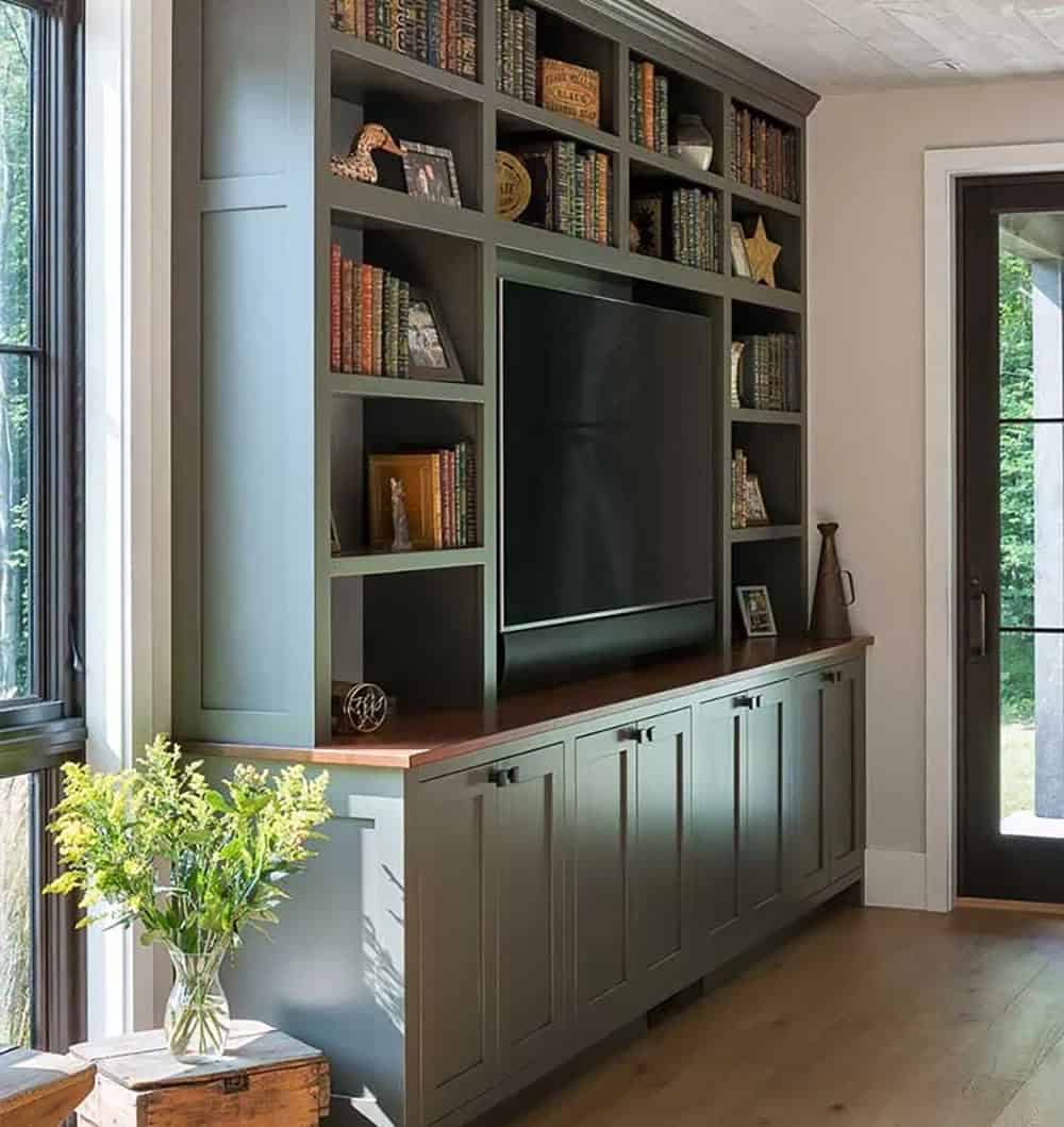 modern rustic family room entertainment wall with a TV