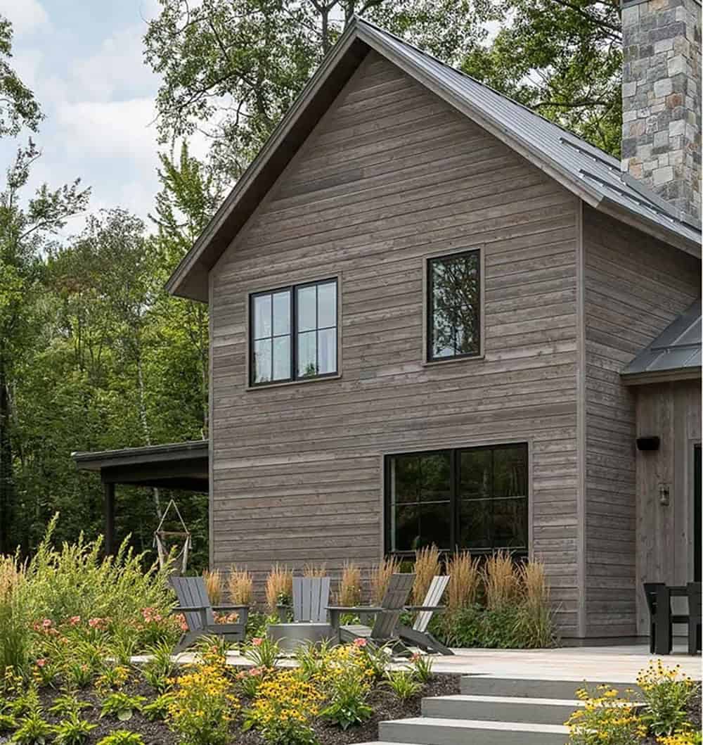 modern rustic home exterior backyard view