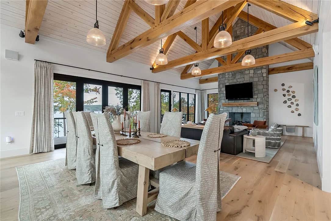contemporary dining room with a view of the living room