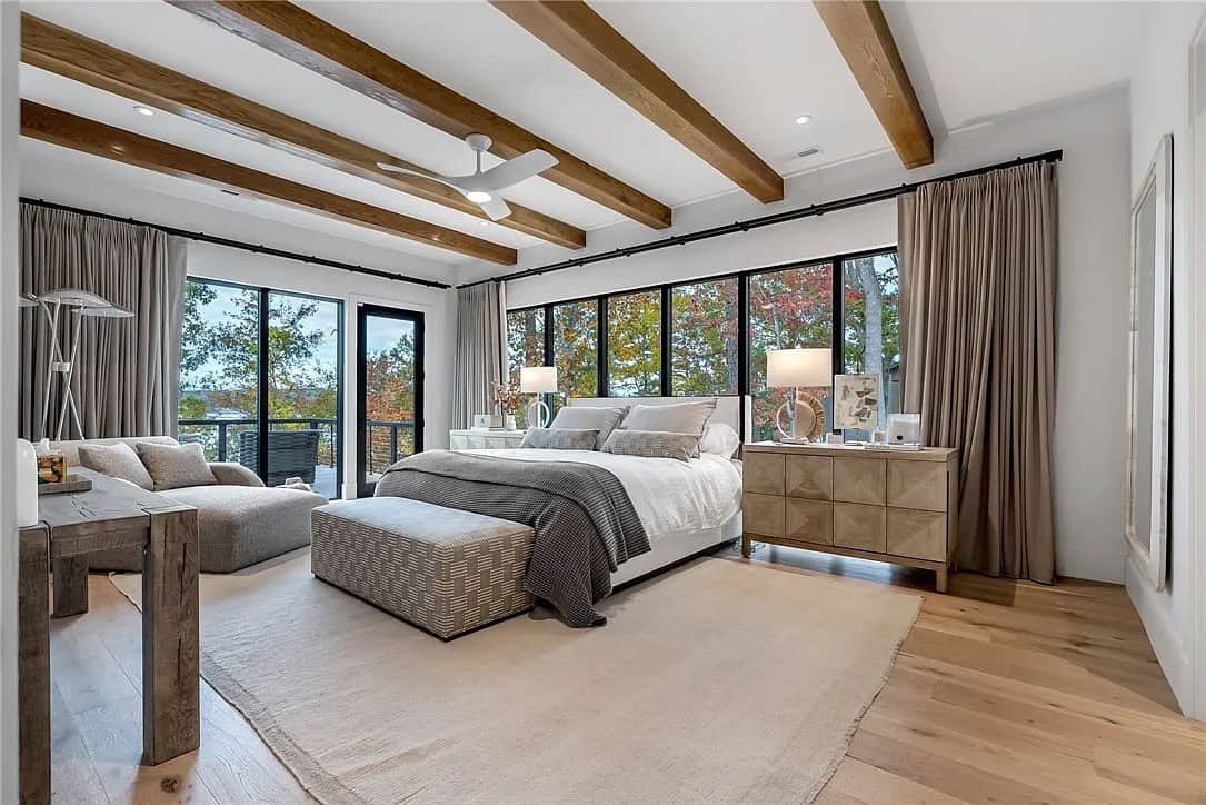 contemporary bedroom with large windows