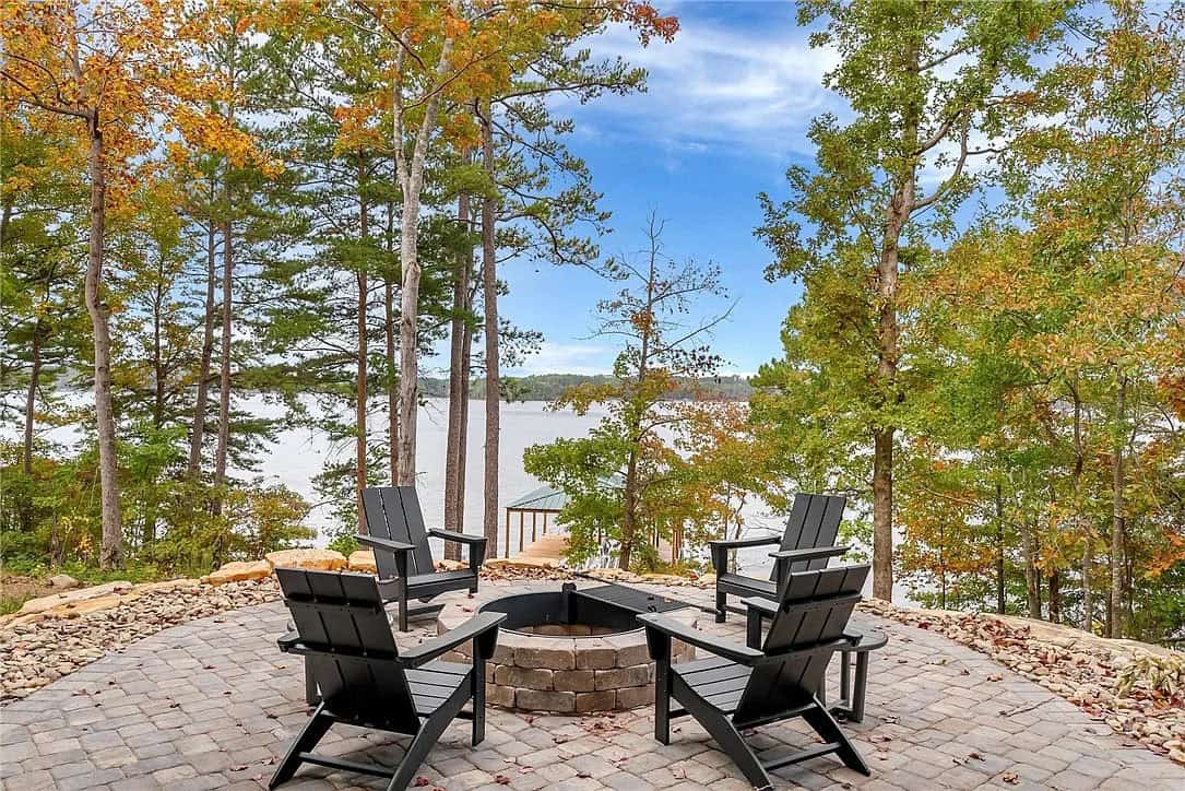 lake house exterior firepit with adirondack chairs