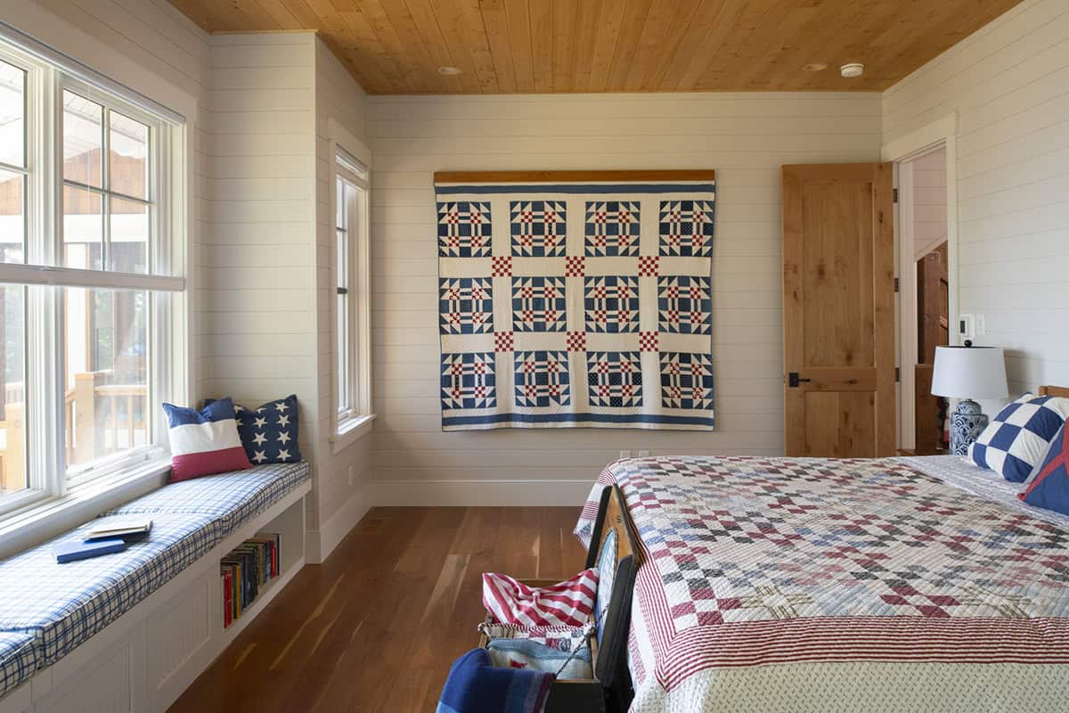rustic bedroom with a built-in window seat