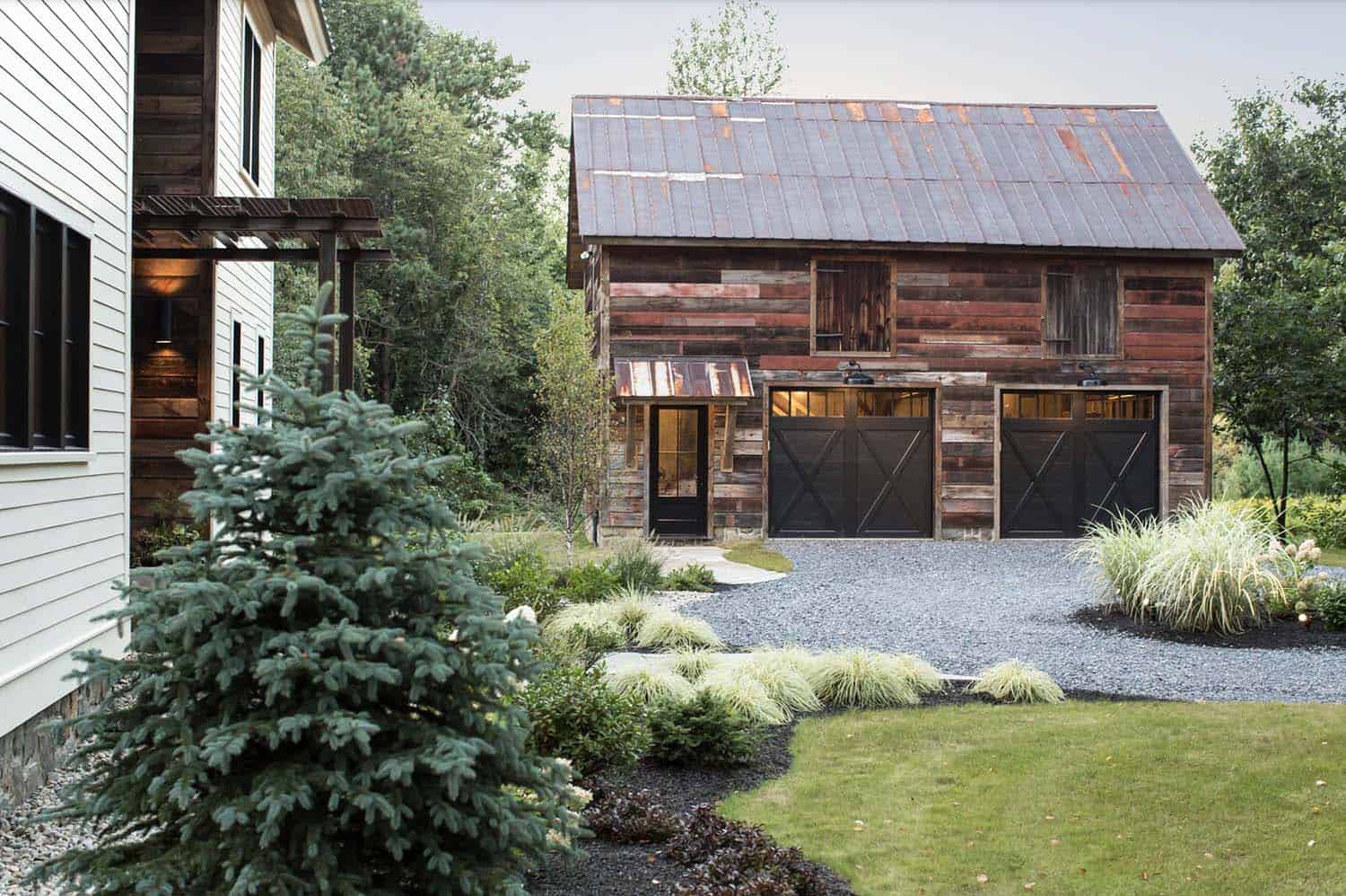 barn house exterior with a garage