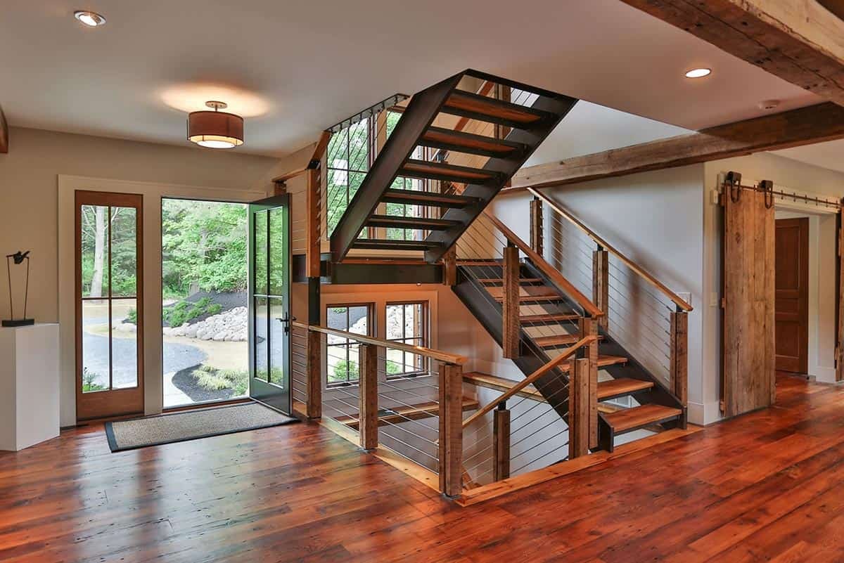 barn house entry with a staircase