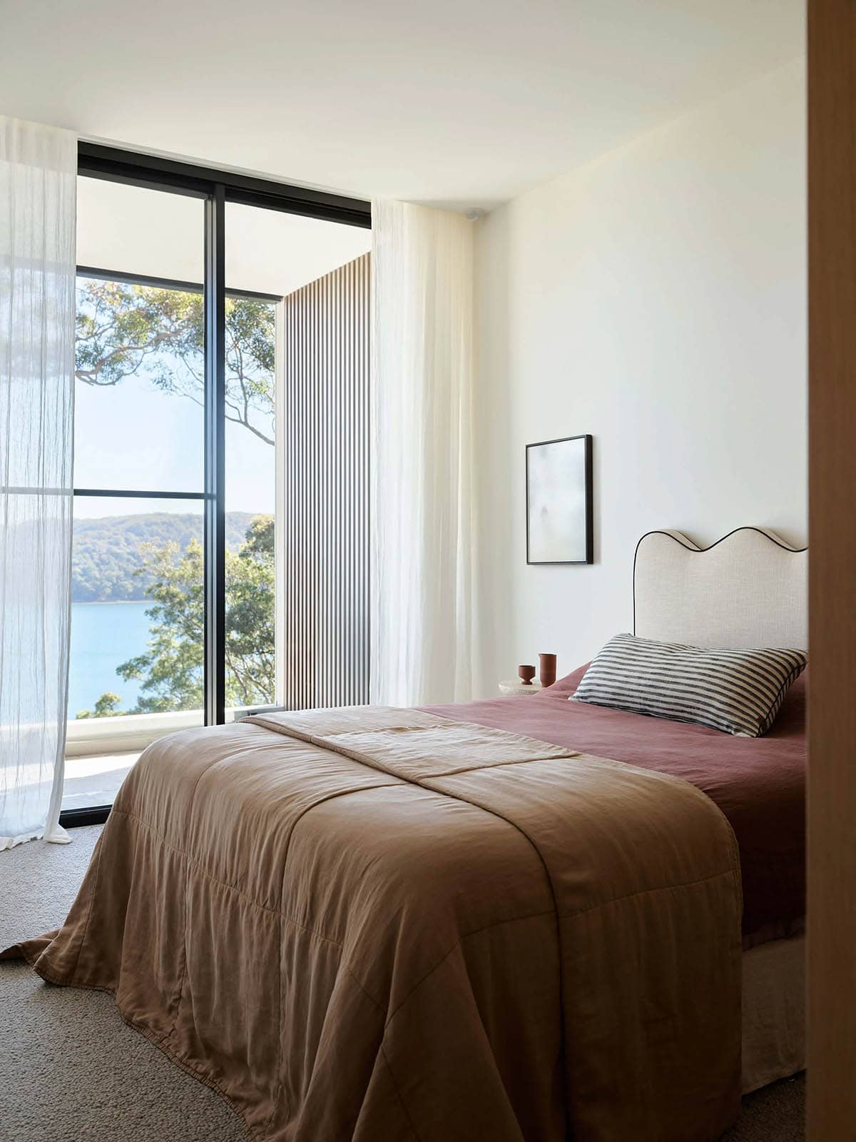 modern bedroom with a sliding glass door