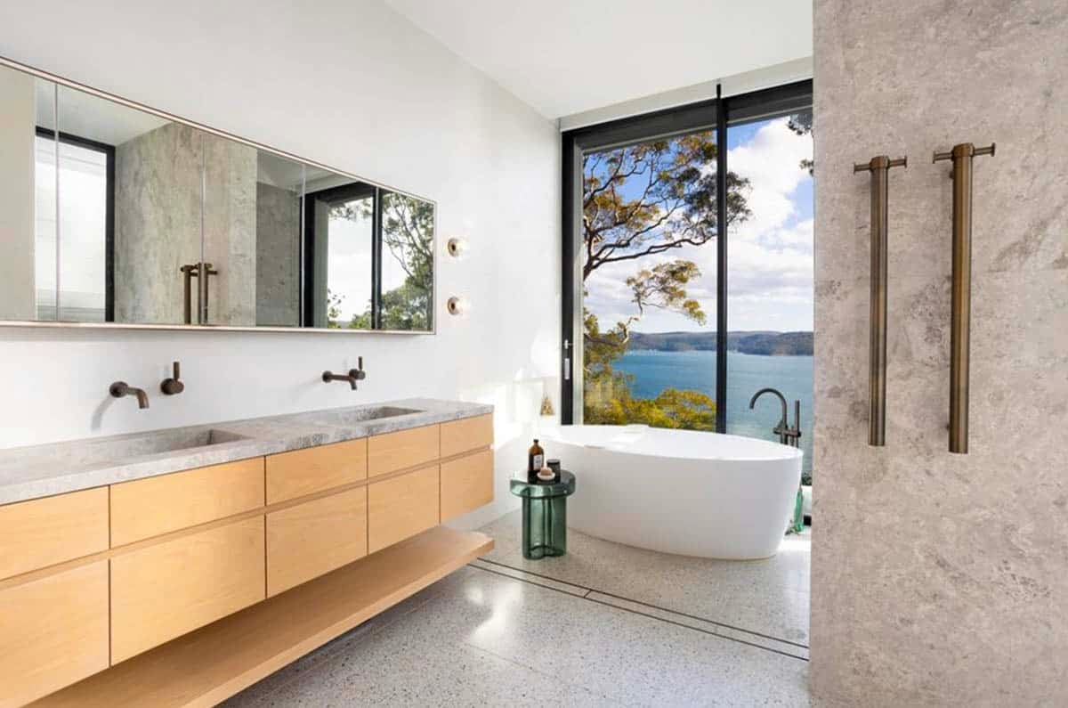 modern bathroom with a vanity and freestanding tub