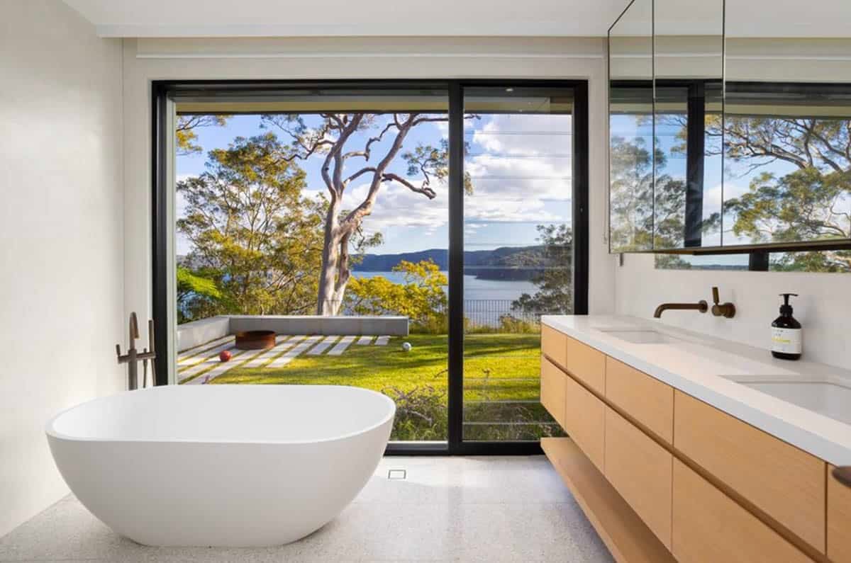 modern bathroom with a vanity and freestanding tub