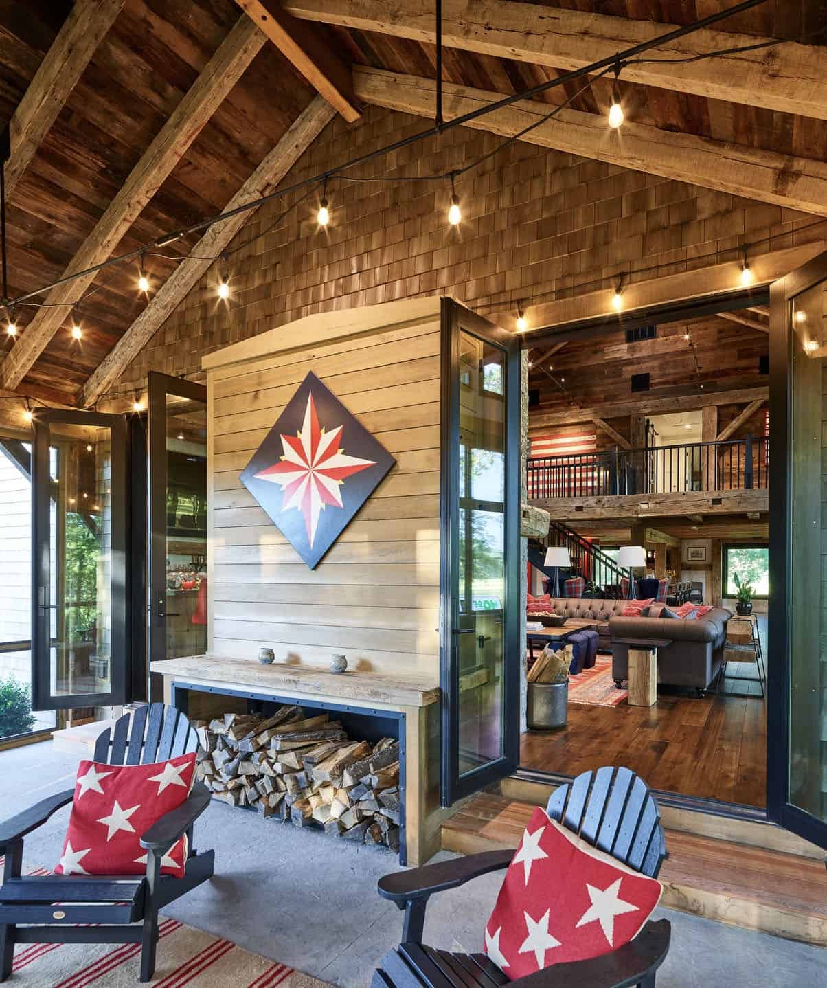 modern rustic screened porch with a fireplace