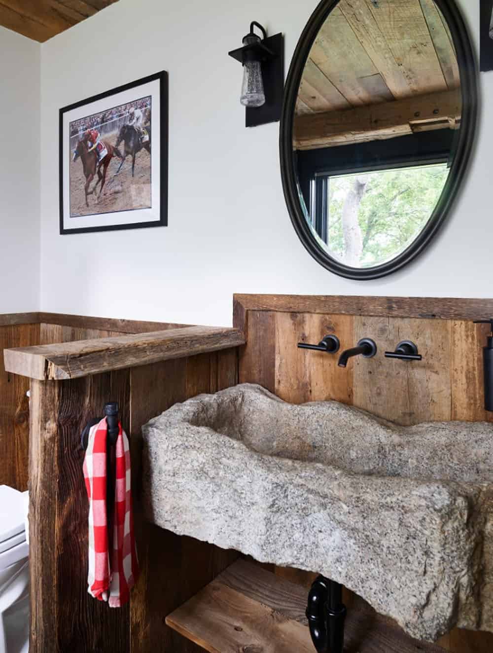 modern rustic bathroom with a stone sink