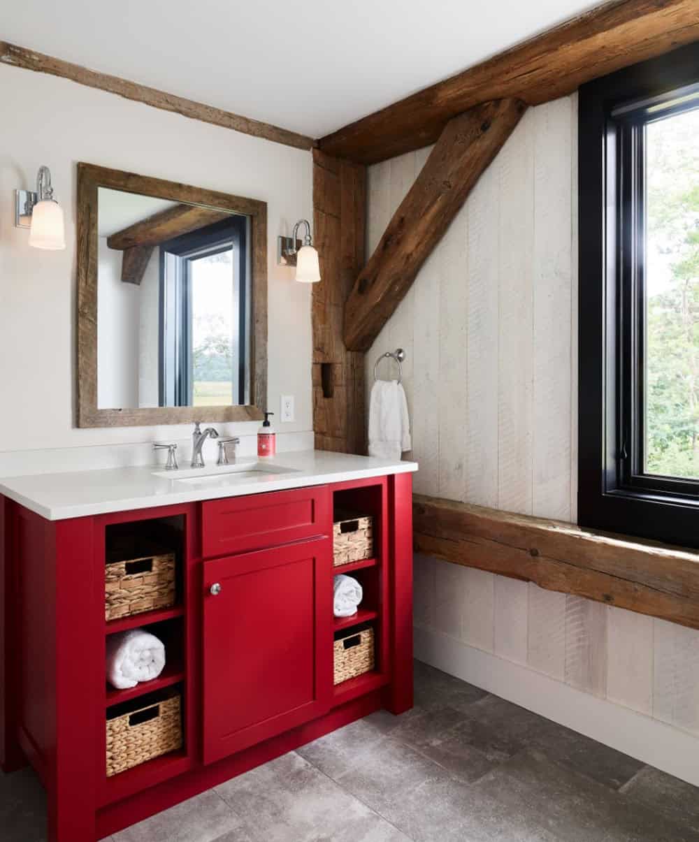 modern rustic bathroom with a red painted vanity
