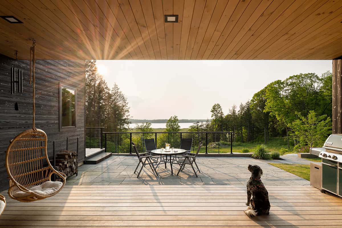 modern home exterior covered porch with alfresco dining