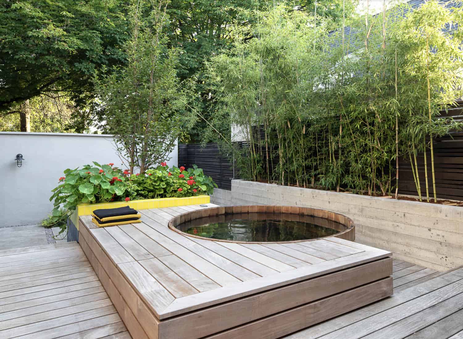 small modern ipe deck with a cedar soaking tub
