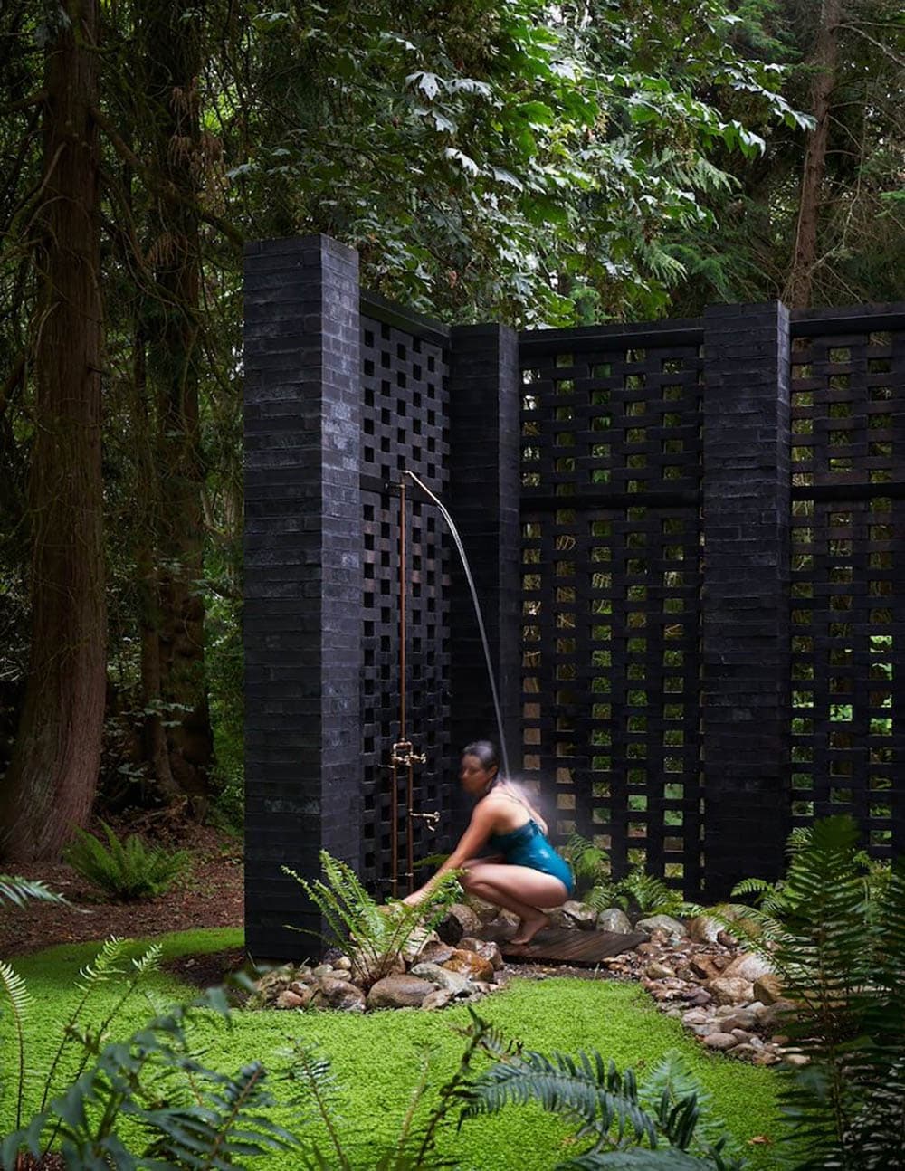 modern home exterior with an outdoor shower