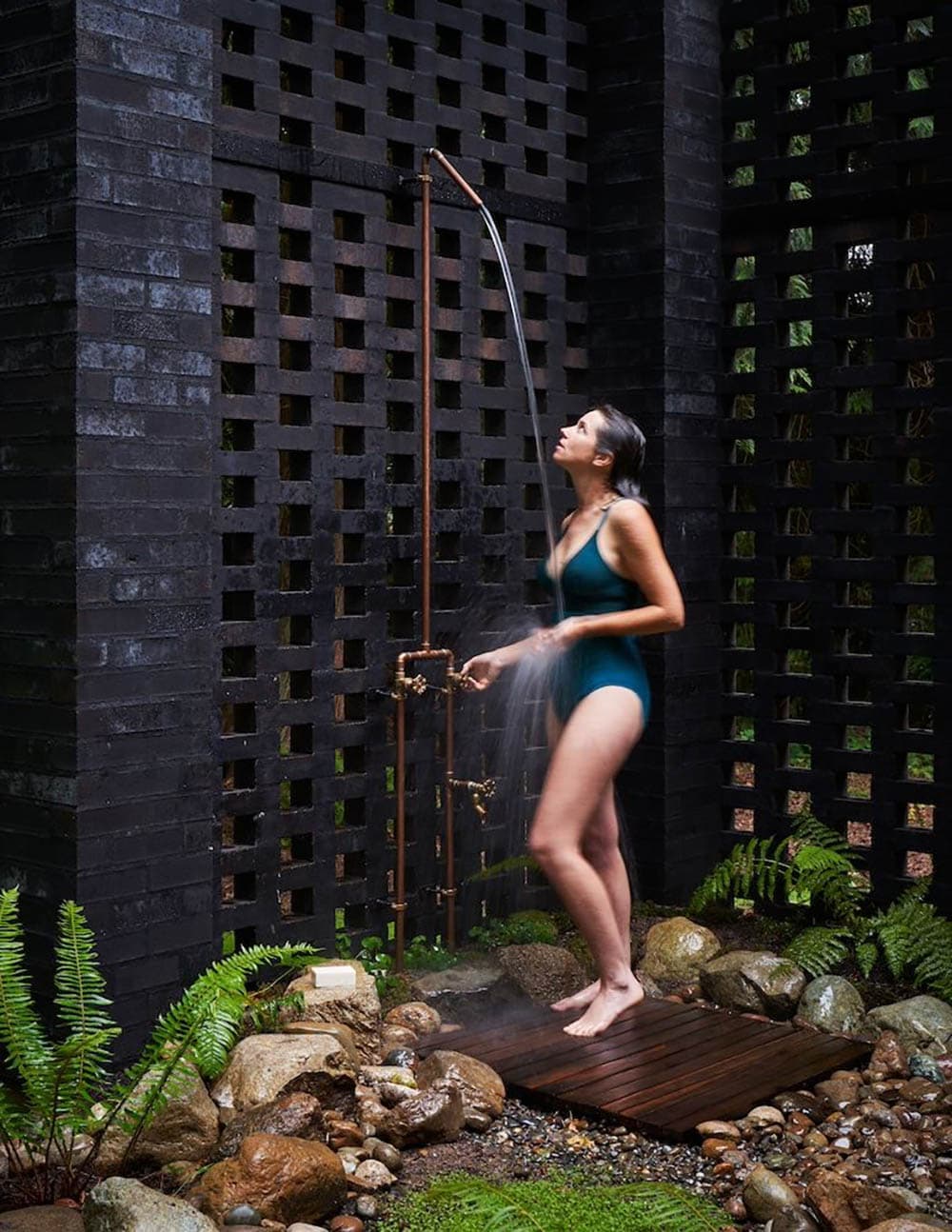 modern home exterior with an outdoor shower