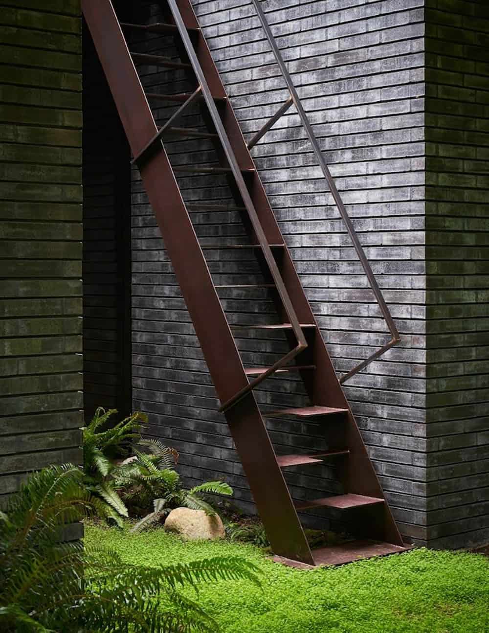 modern home exterior with a staircase