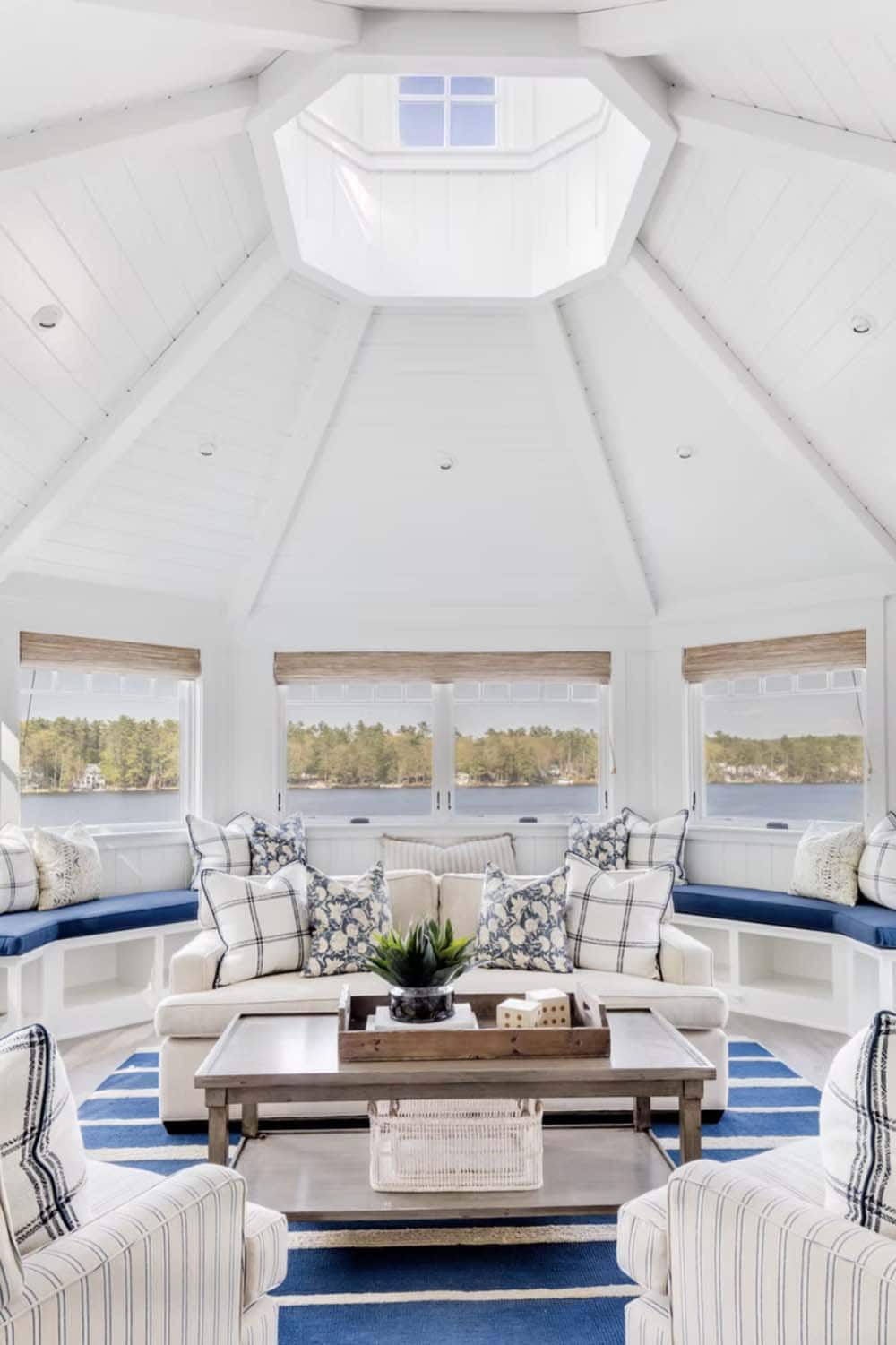 coastal style family room with a skylight