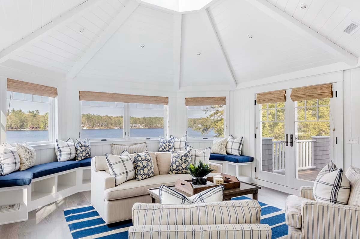 coastal style family room with a skylight