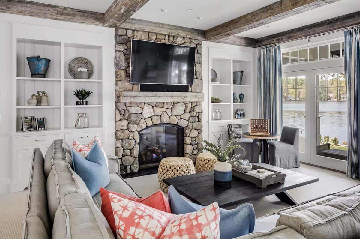 coastal style living room with a fireplace