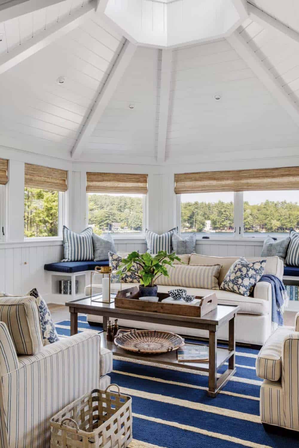 coastal style family room with a skylight