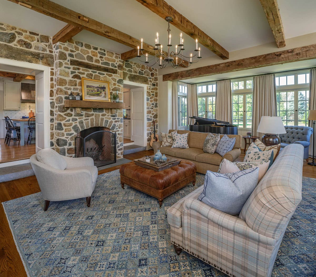 farmhouse style living room with a fireplace