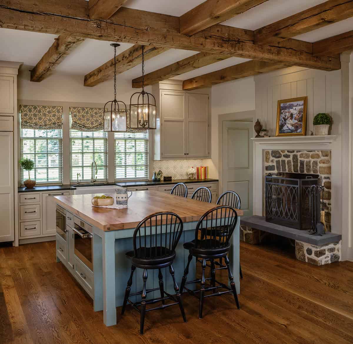 farmhouse style kitchen with a fireplace