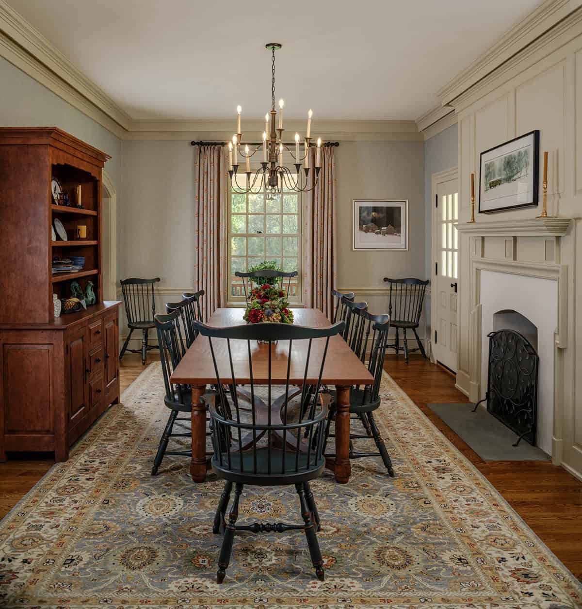 farmhouse style dining room with a fireplace