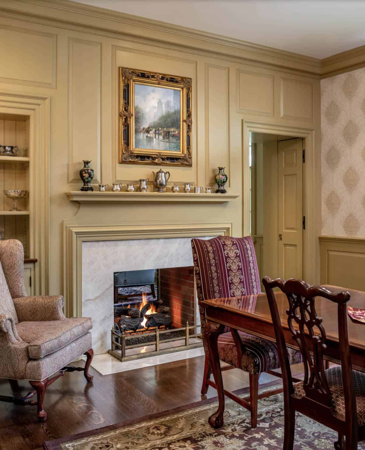 traditional style dining room with a fireplace