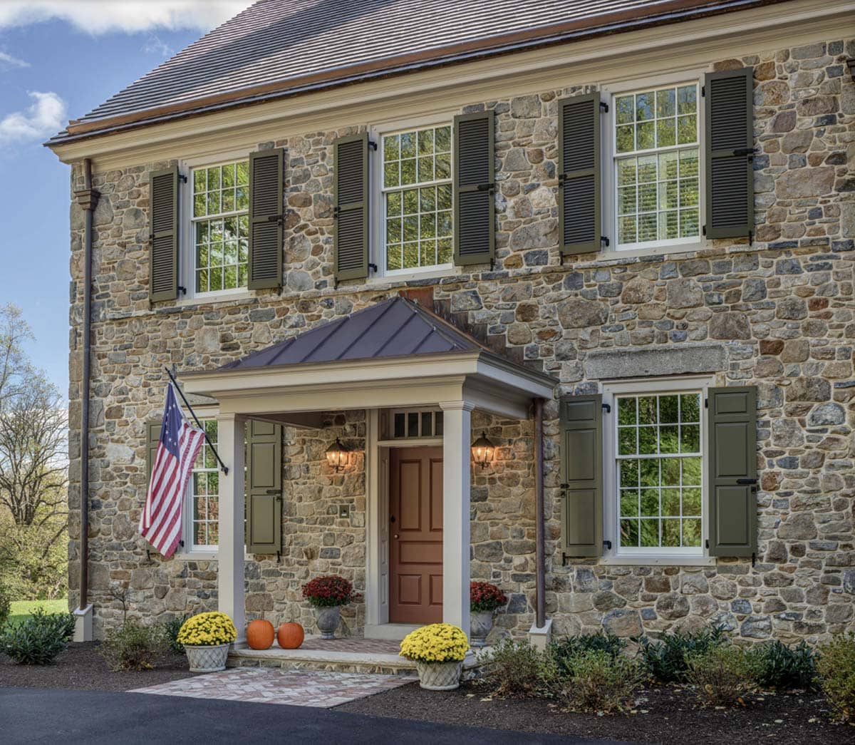 stone farmhouse style house exterior entry