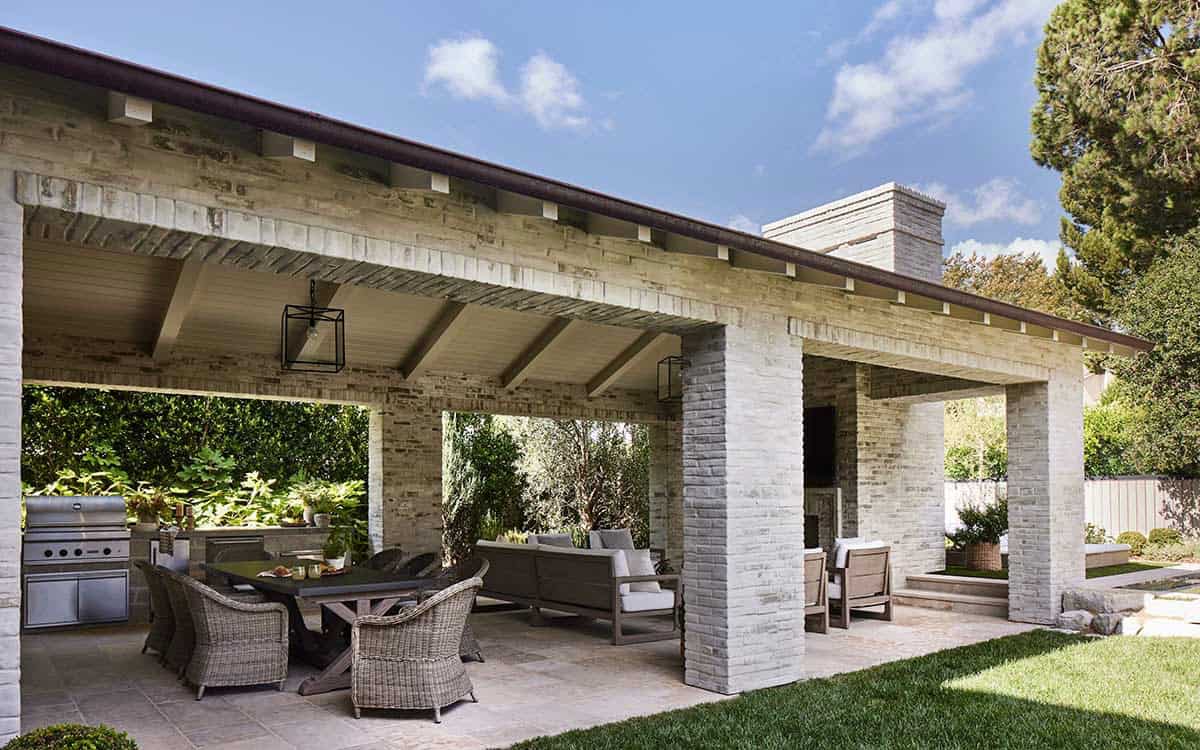 transitiional style home exterior with a covered patio