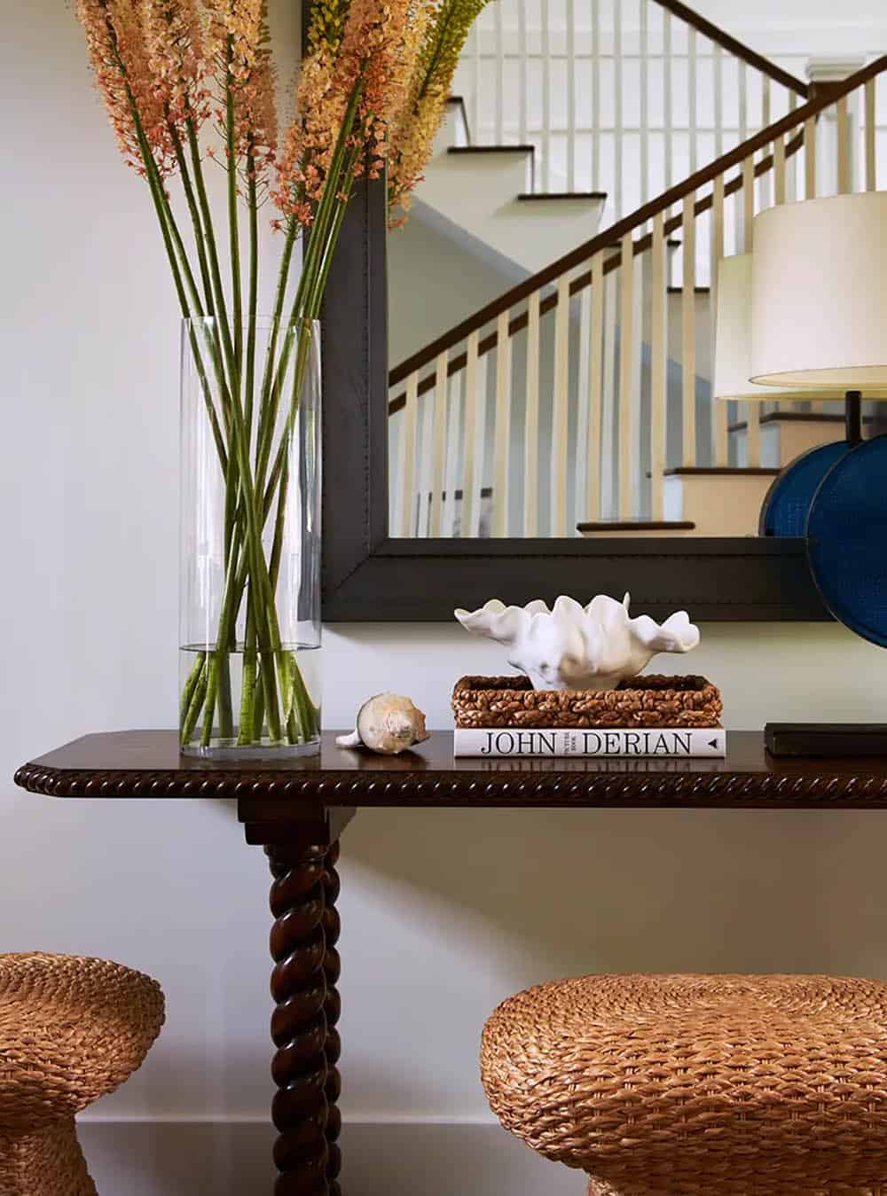 transitional style home entry with a console table