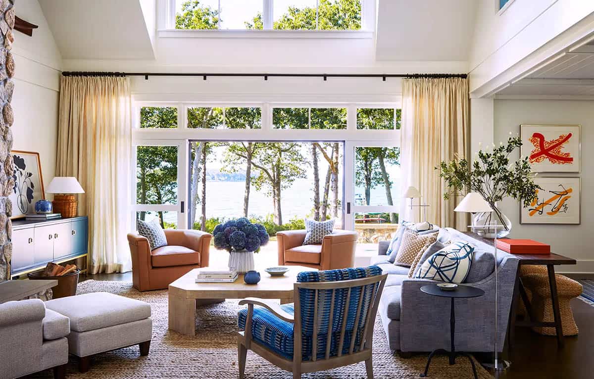 transitional style living room with large windows