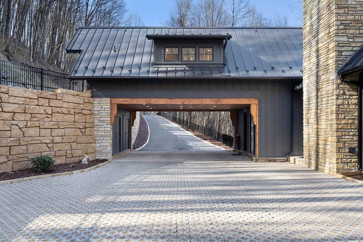 mountain cottage exterior bridge over the driveway 